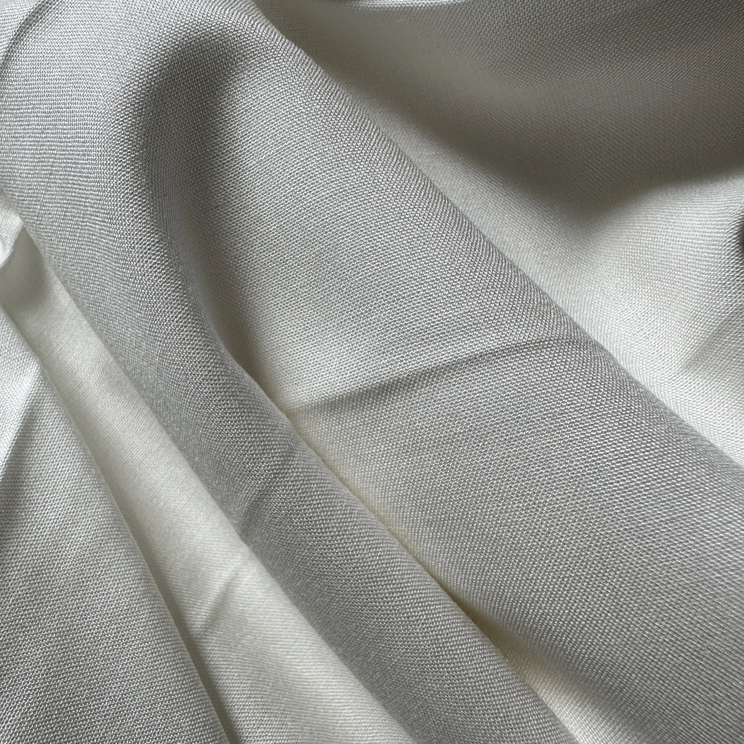 100% Aloe Vera plain fabric made from plant-based fiber with soft natural texture for sustainable clothing.