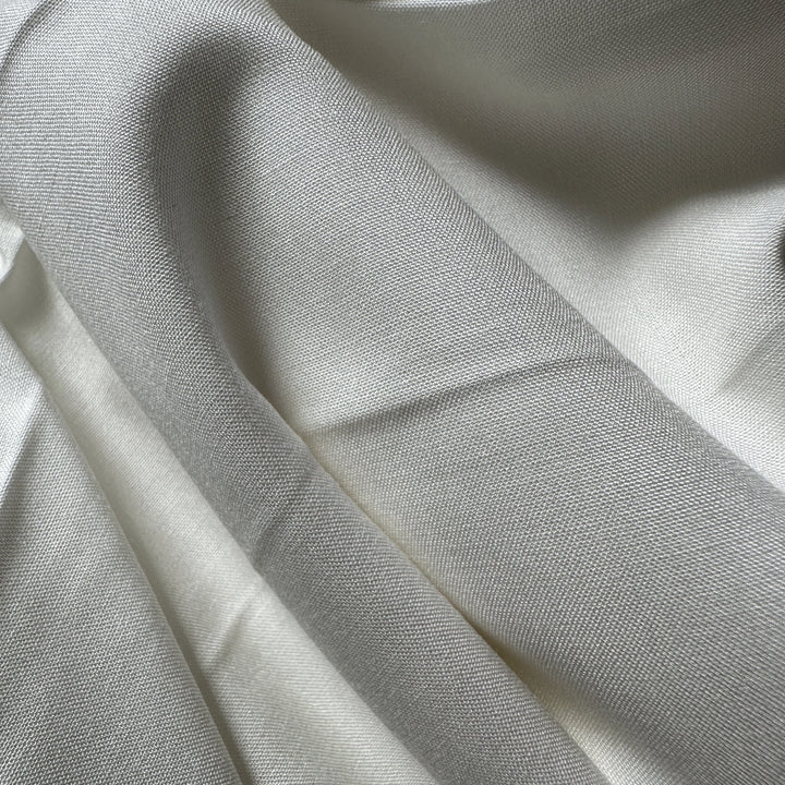 100% Aloe Vera plain fabric made from plant-based fiber with soft natural texture for sustainable clothing.