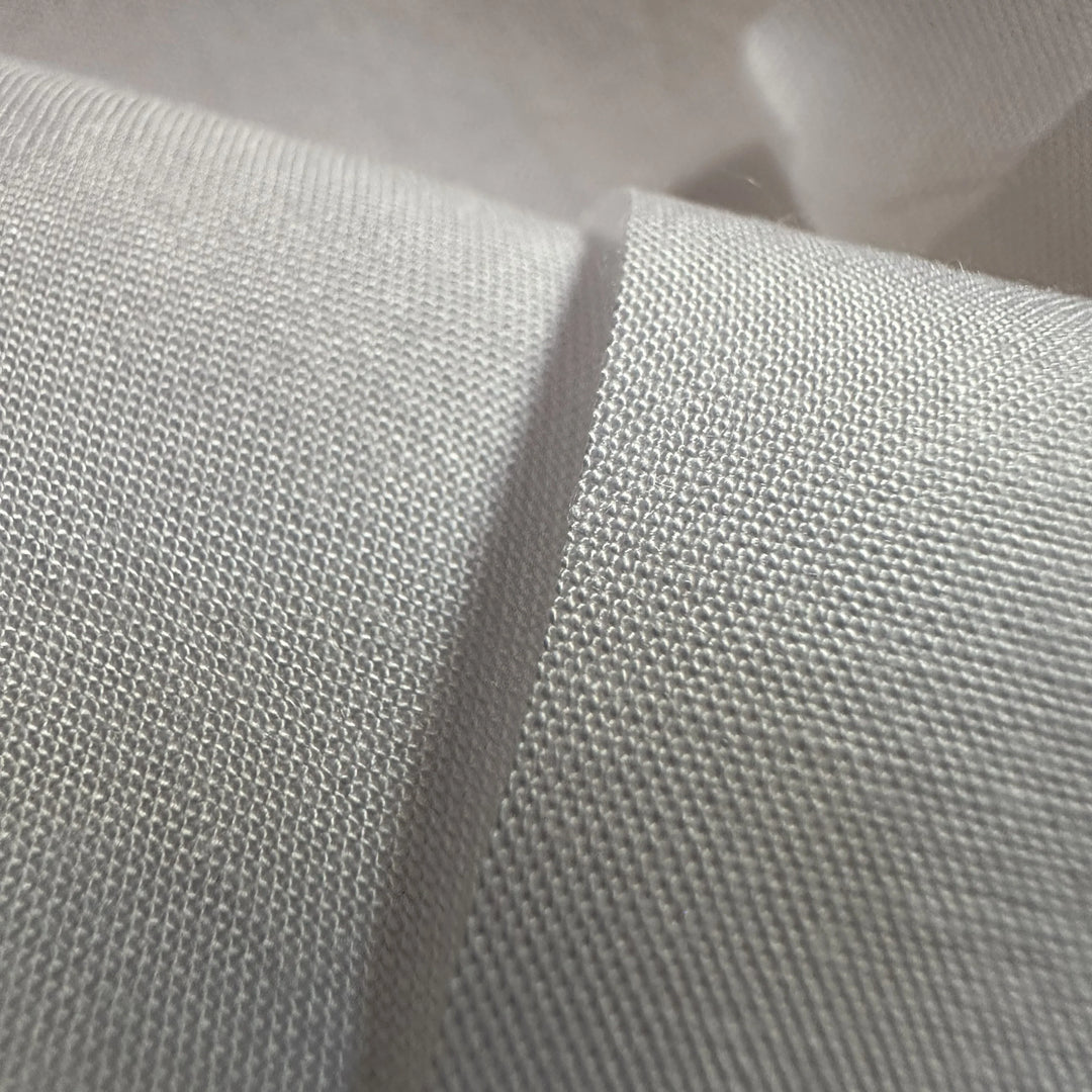 Lightweight banana plain fabric showing clean weave texture for eco-fashion production