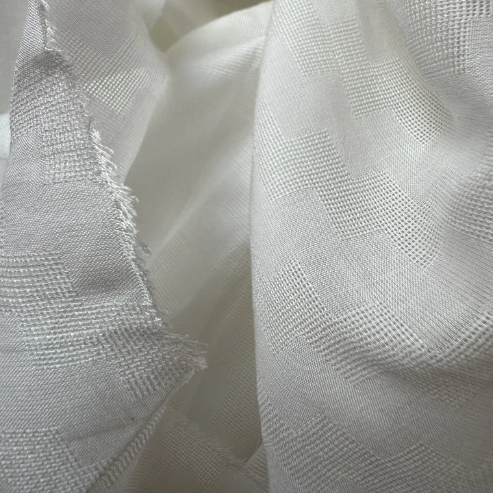 Dobby weave banana fabric with natural texture and intricate pattern