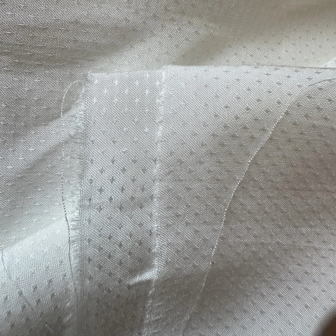 Soft banana fabric with intricate dotted dobby weave