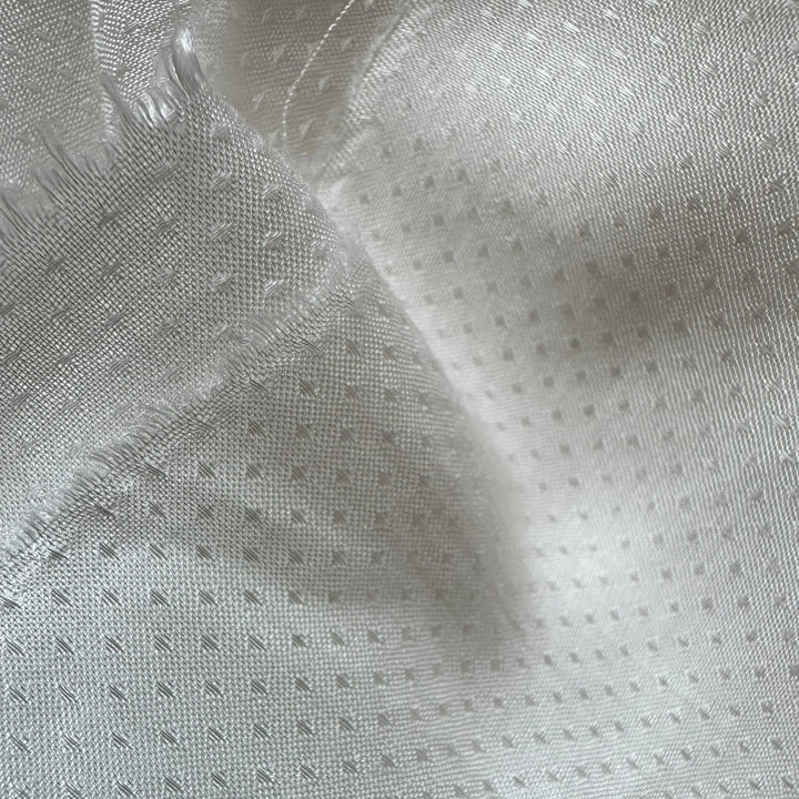 Dotted dobby weave banana fabric with natural texture