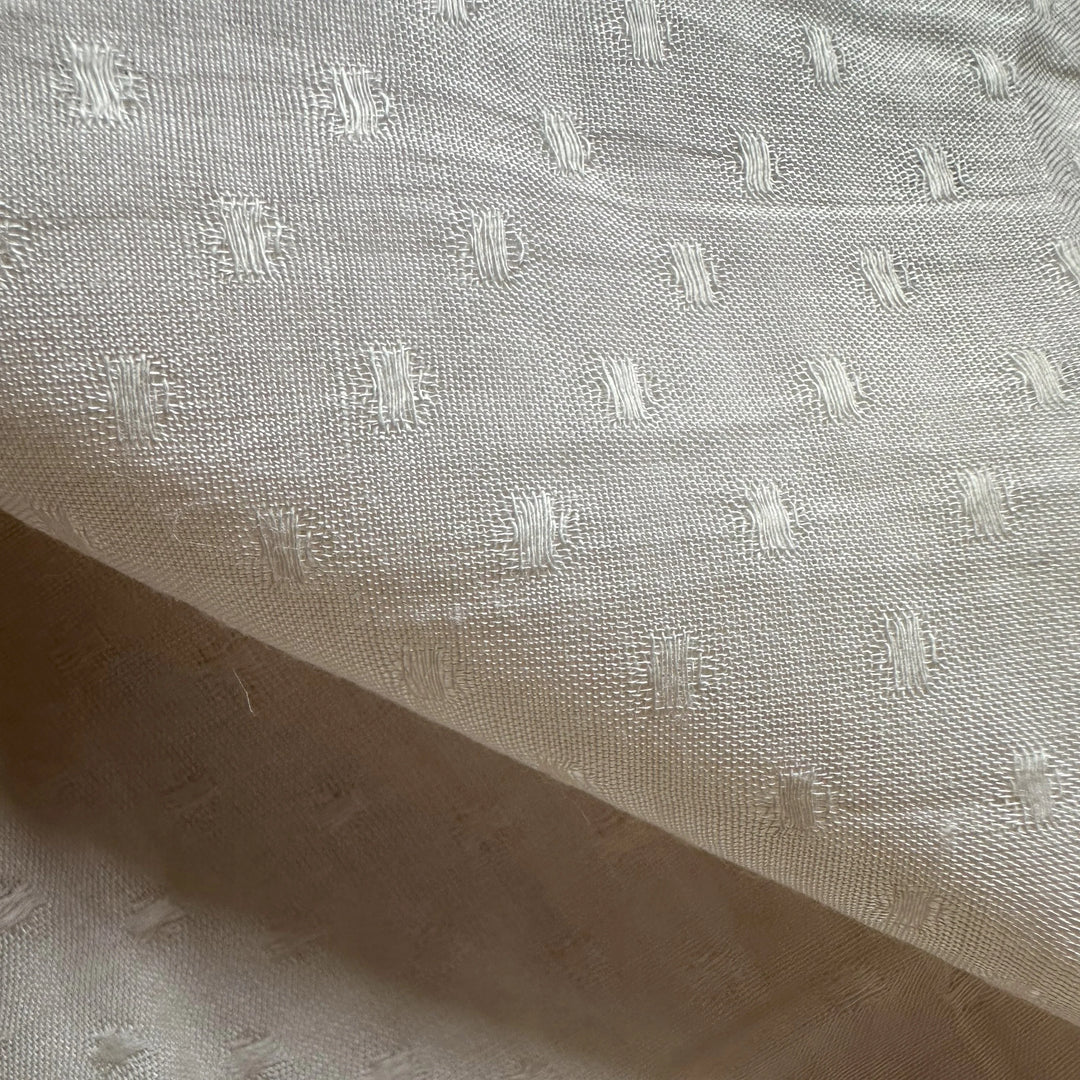 Natural handwoven banana fabric with circle dobby texture