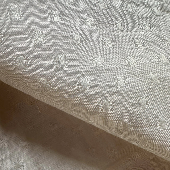 Natural handwoven banana fabric with circle dobby texture