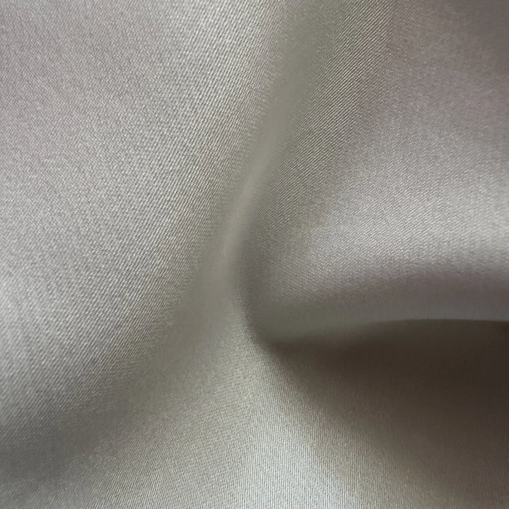 100% organic bamboo satin fabric with a soft, silky surface and natural sheen for sustainable fashion