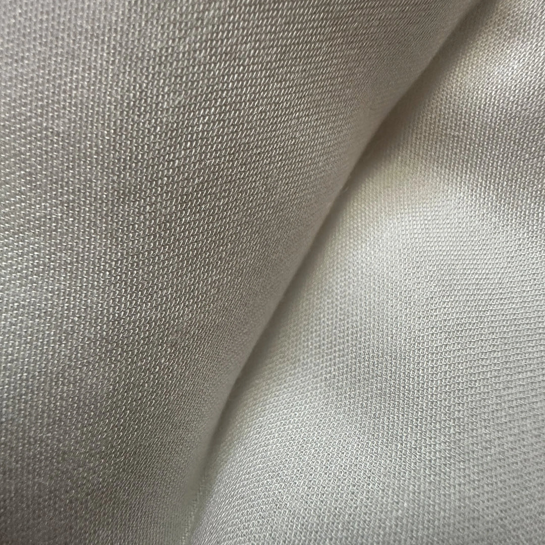 Organic bamboo satin fabric close-up highlighting lustrous finish and refined weave quality