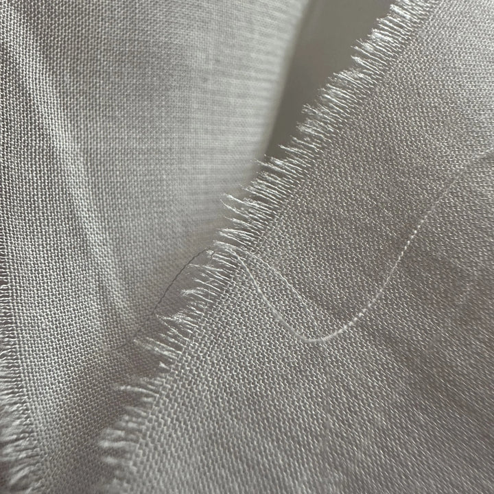 Close-up of 85% organic bamboo 15% cotton fabric showing lightweight plain weave and breathable texture