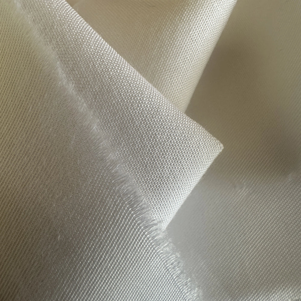 Plant-based bamboo lyocell fabric blend soft durable breathable and eco-conscious textile material.