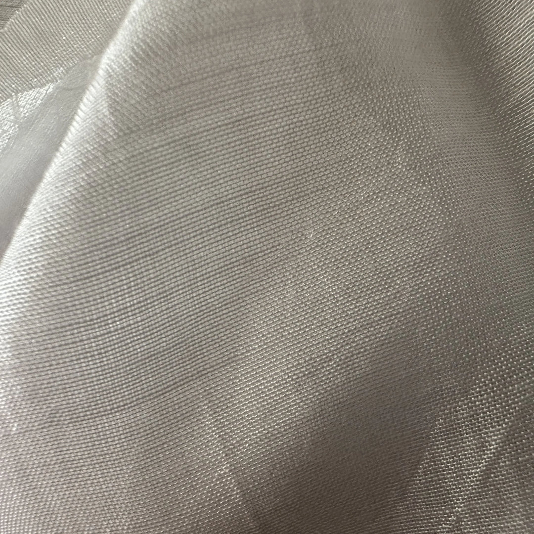 Organic bamboo and silk fabric close-up highlighting fine texture and subtle natural sheen