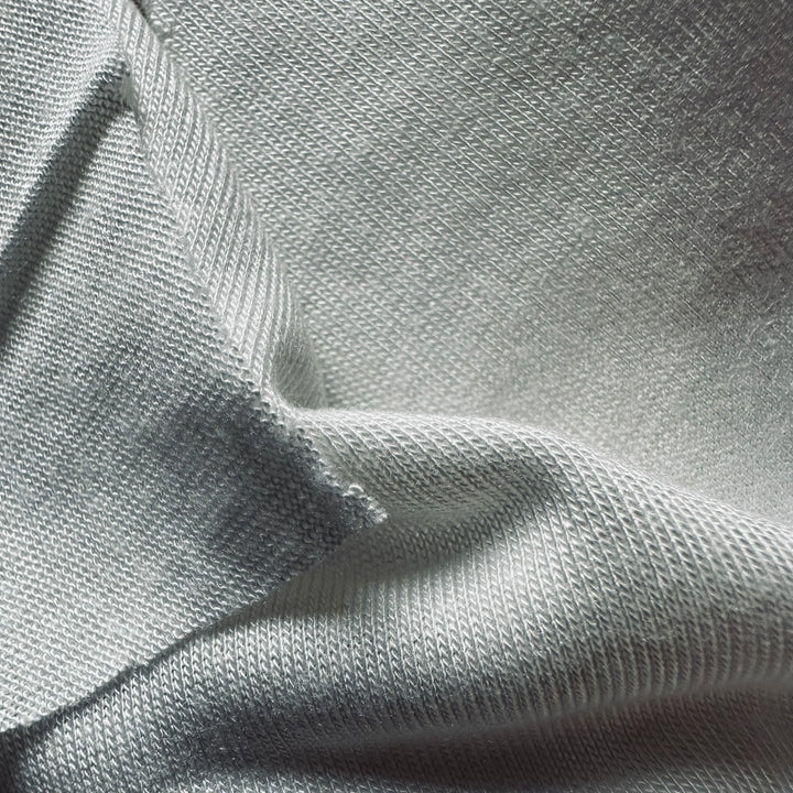 Close-up view of 100% Jasmine cellulose fabric highlighting fine knit construction and softness