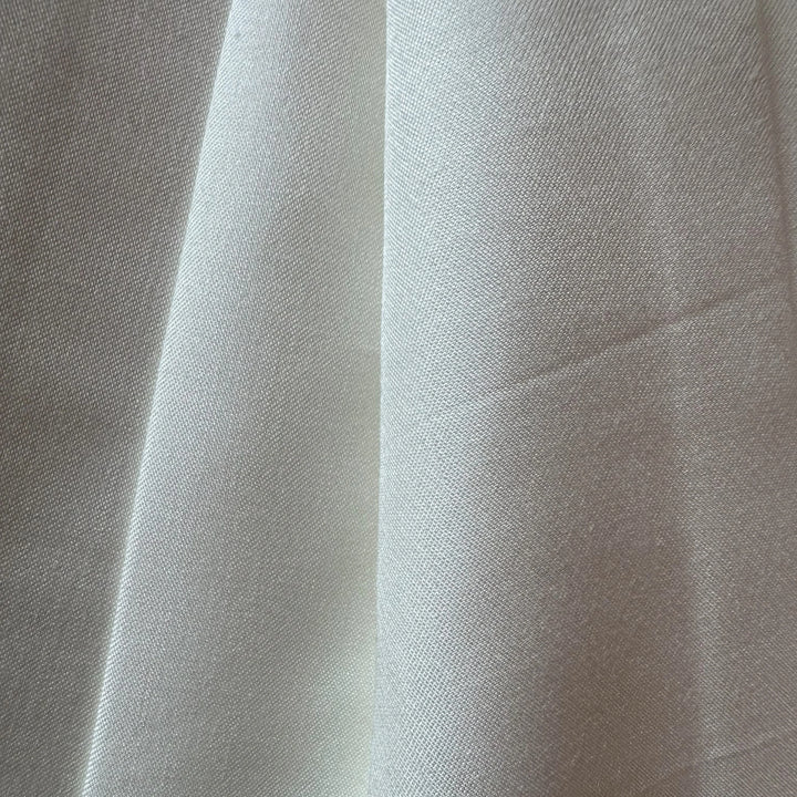Sustainable lotus fiber textile folded neatly, ideal for luxury eco fashion.