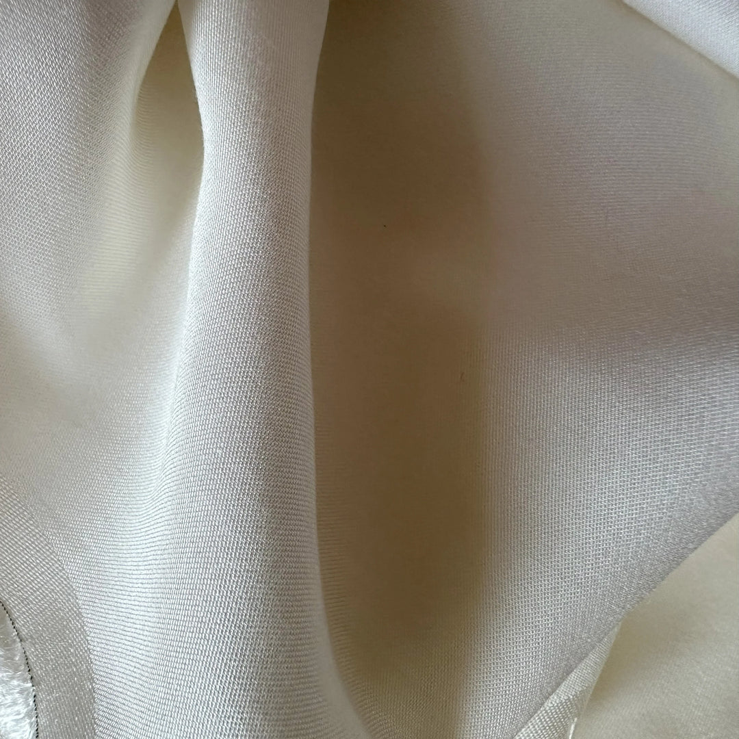 Lotus stem-based fabric in neutral tone, representing eco-friendly craftsmanship.