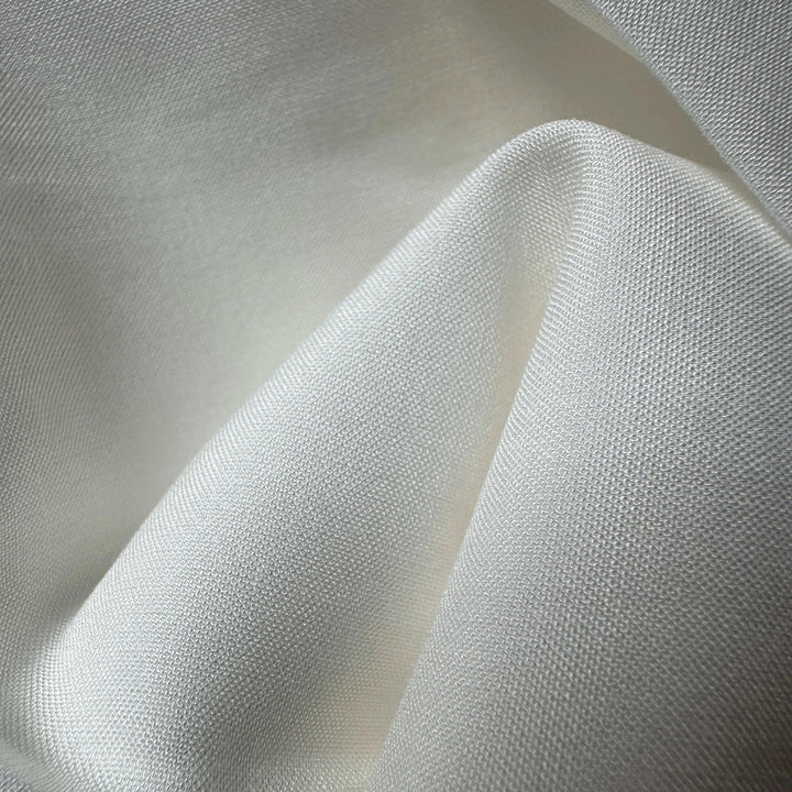 Lotus stem-based fabric in neutral tone, representing eco-friendly craftsmanship.