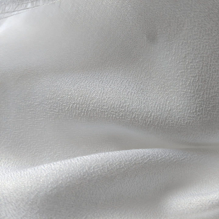 Milk-based cellulose fabric used in eco-conscious clothing production.