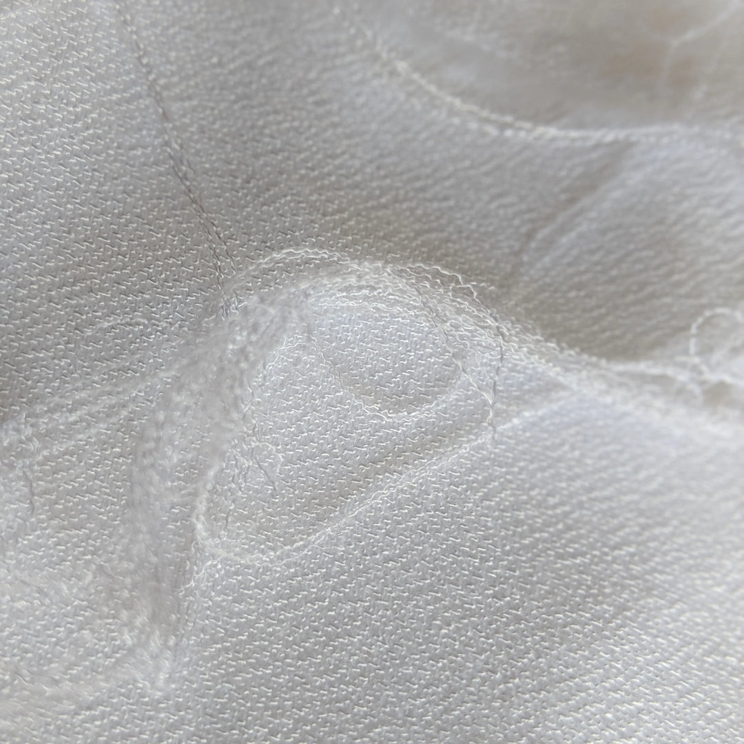 Luxury sustainable fabric made from dairy waste, environmentally friendly.