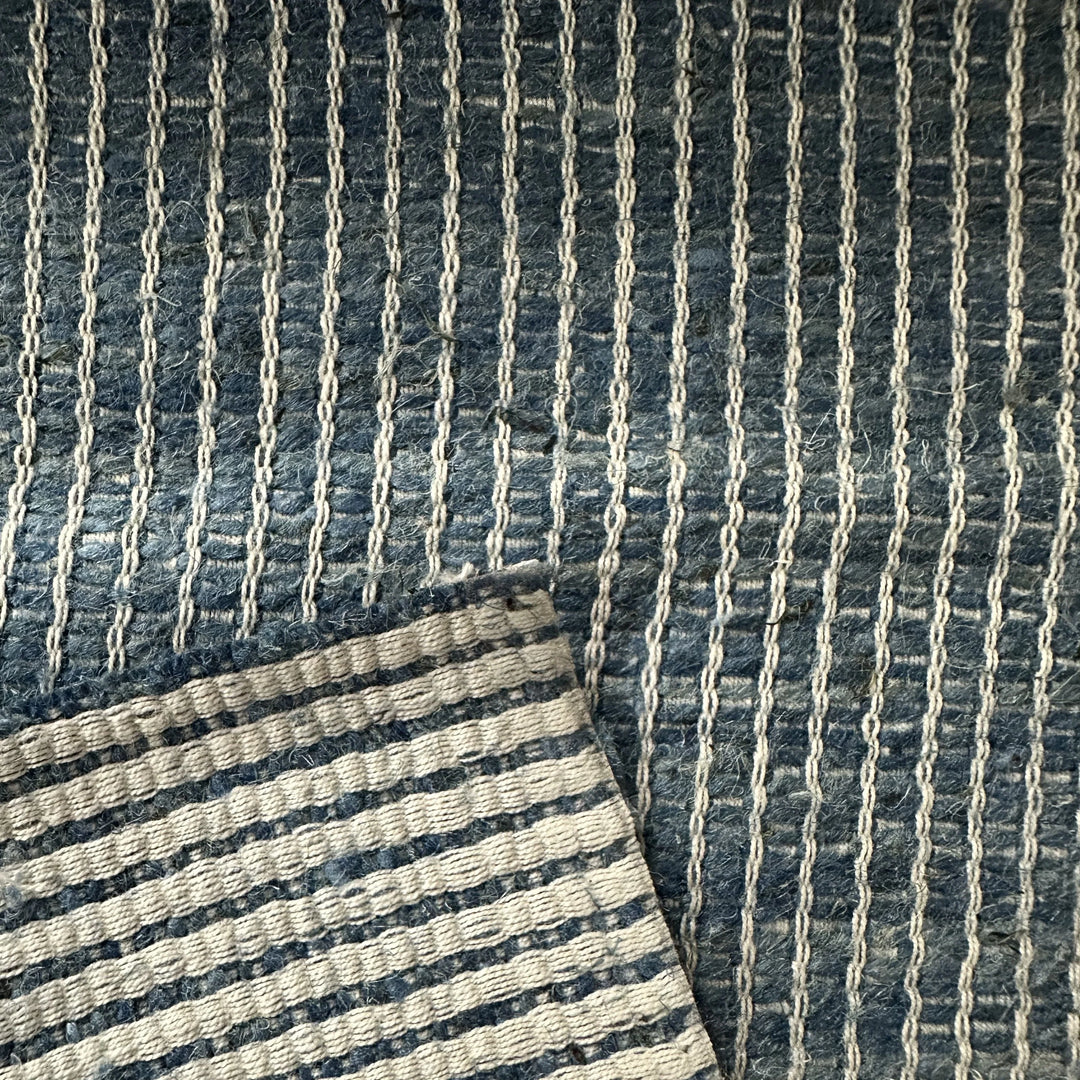 Close-up of handwoven natural yarn dyed nettle fabric from the Himalayas