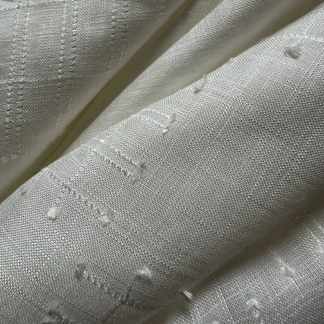 Olive cellulose fabric for sustainable apparel, linings, and lightweight garment applications.