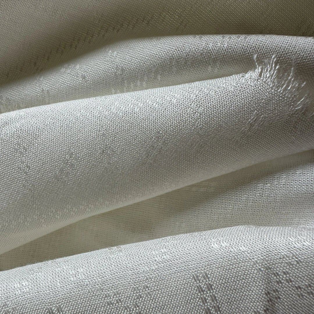 Ayurkruti olive cellulose fabric showing smooth drape and natural fiber appearance.