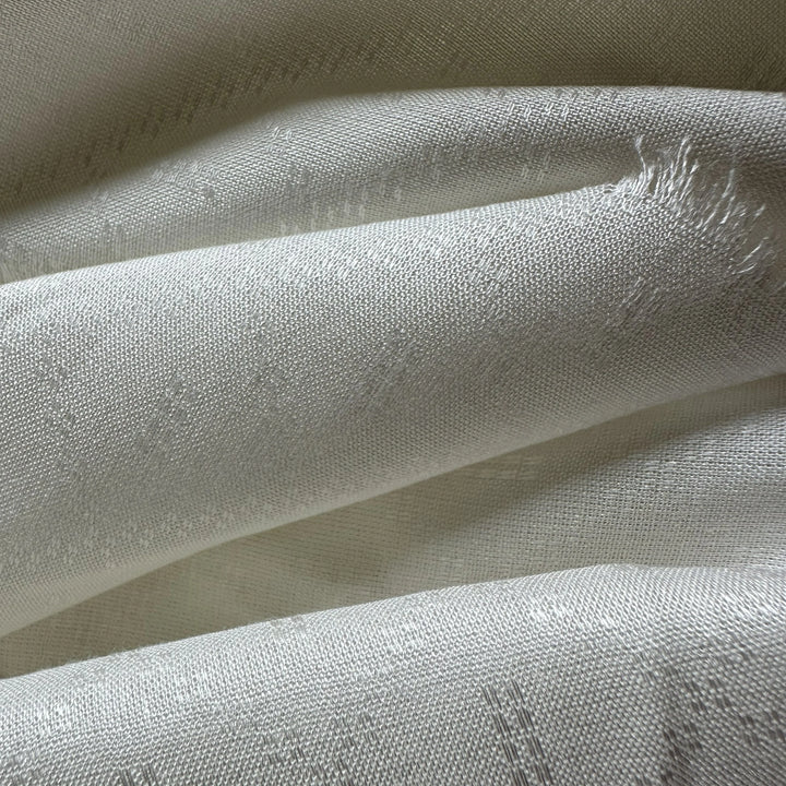 Ayurkruti olive cellulose fabric showing smooth drape and natural fiber appearance.