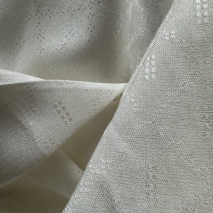 Lightweight olive cellulose fabric ideal for eco-conscious clothing and textile products.