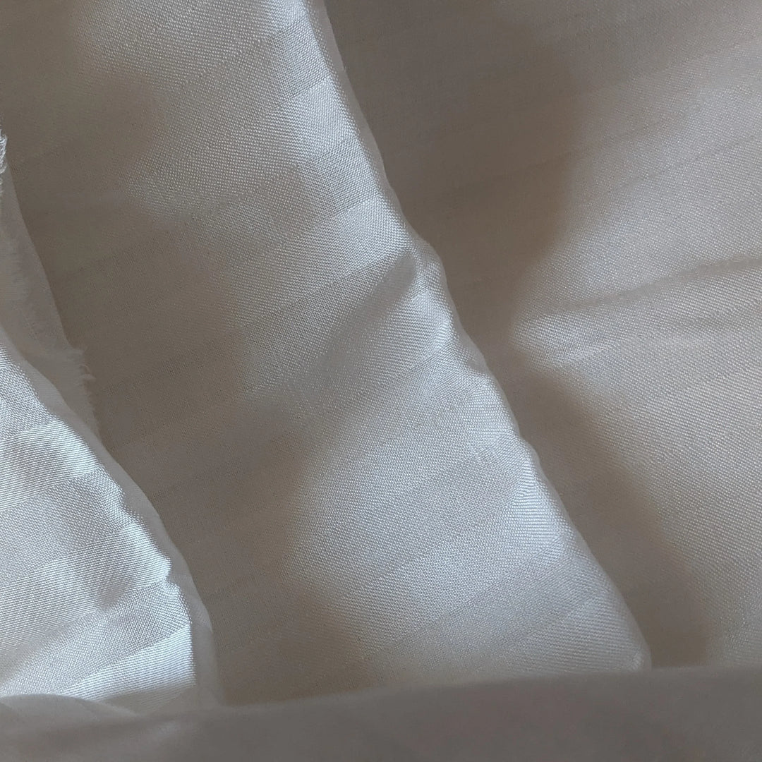 Close-up View of Smooth Orange Fiber Fabric Texture