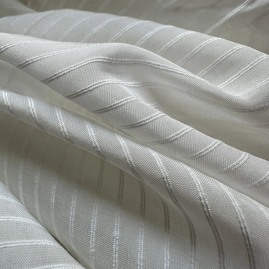 100% organic orange fiber fabric made from citrus waste, eco friendly textile for sustainable fashion brands