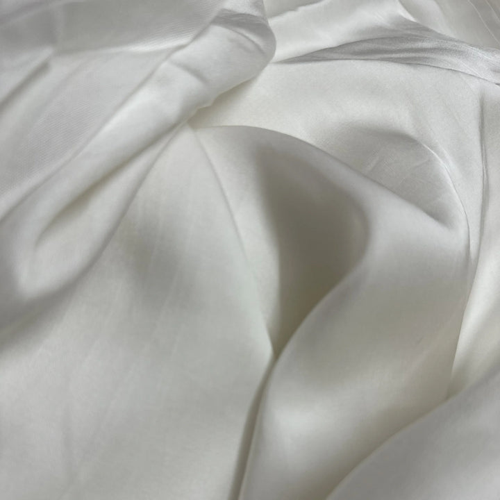 Close-up View of Smooth Orange Fiber Fabric Texture