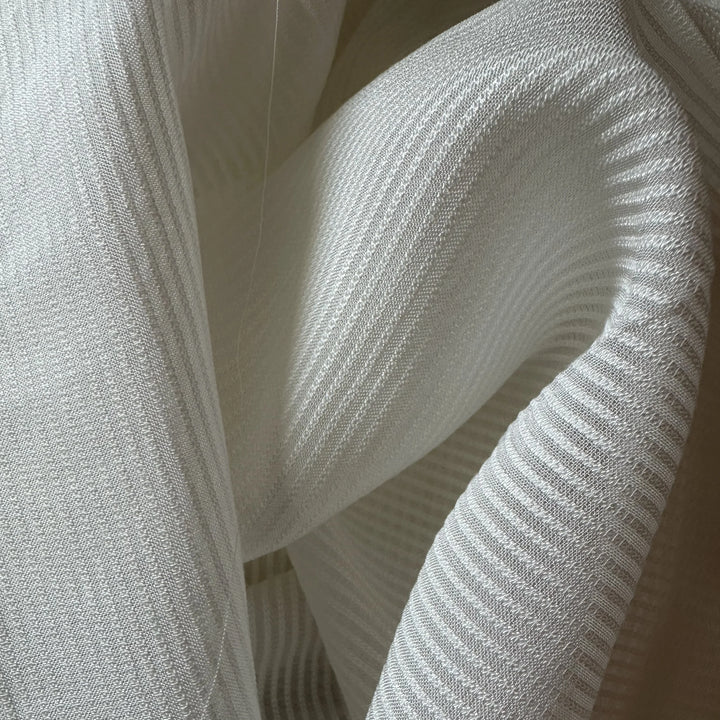 Sustainable orange fiber fabric for eco fashion designers in Europe and USA