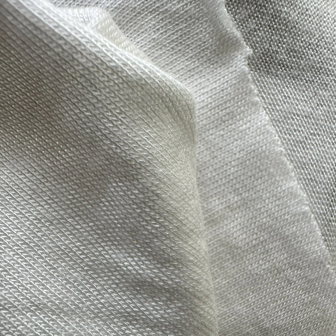 Buy 100% organic Orange knitted fabric – soft, breathable, and eco-friendly