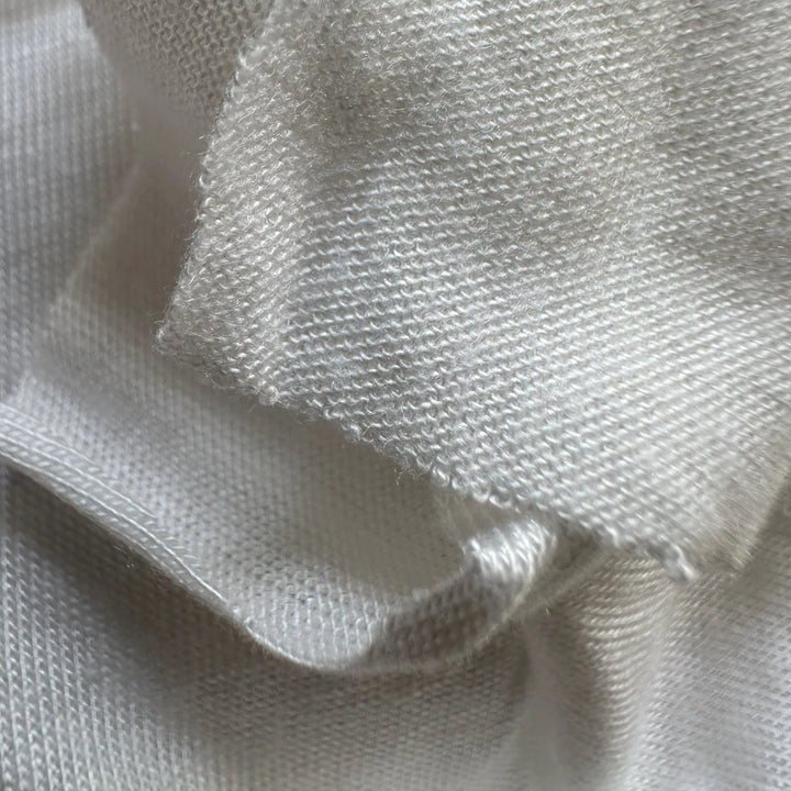 Do you want Premium organic Orange knitted fabric for loungewear, and eco-fashion