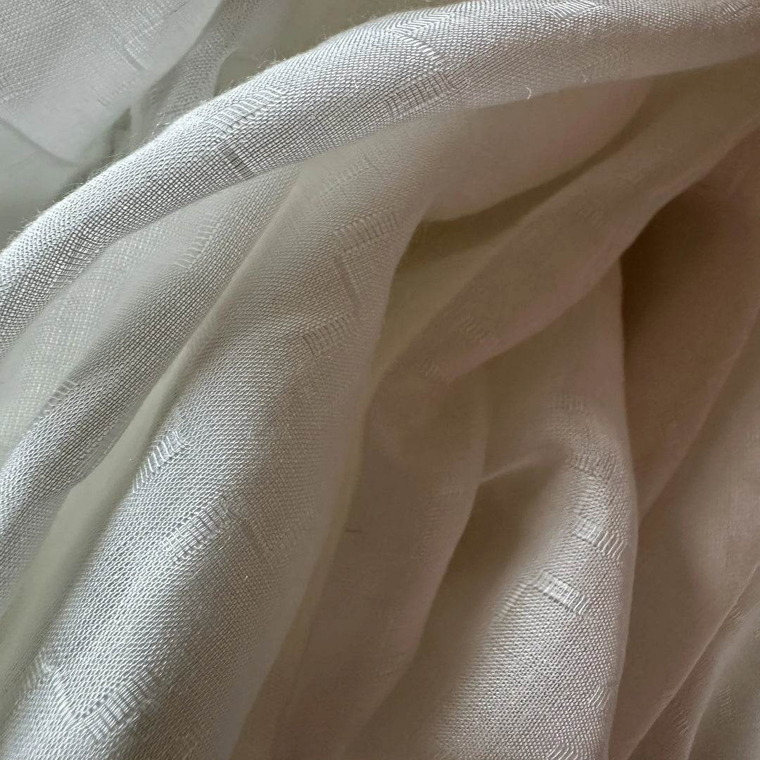 Circular textile innovation using rose petal fiber, offering an animal-free silk alternative for designers