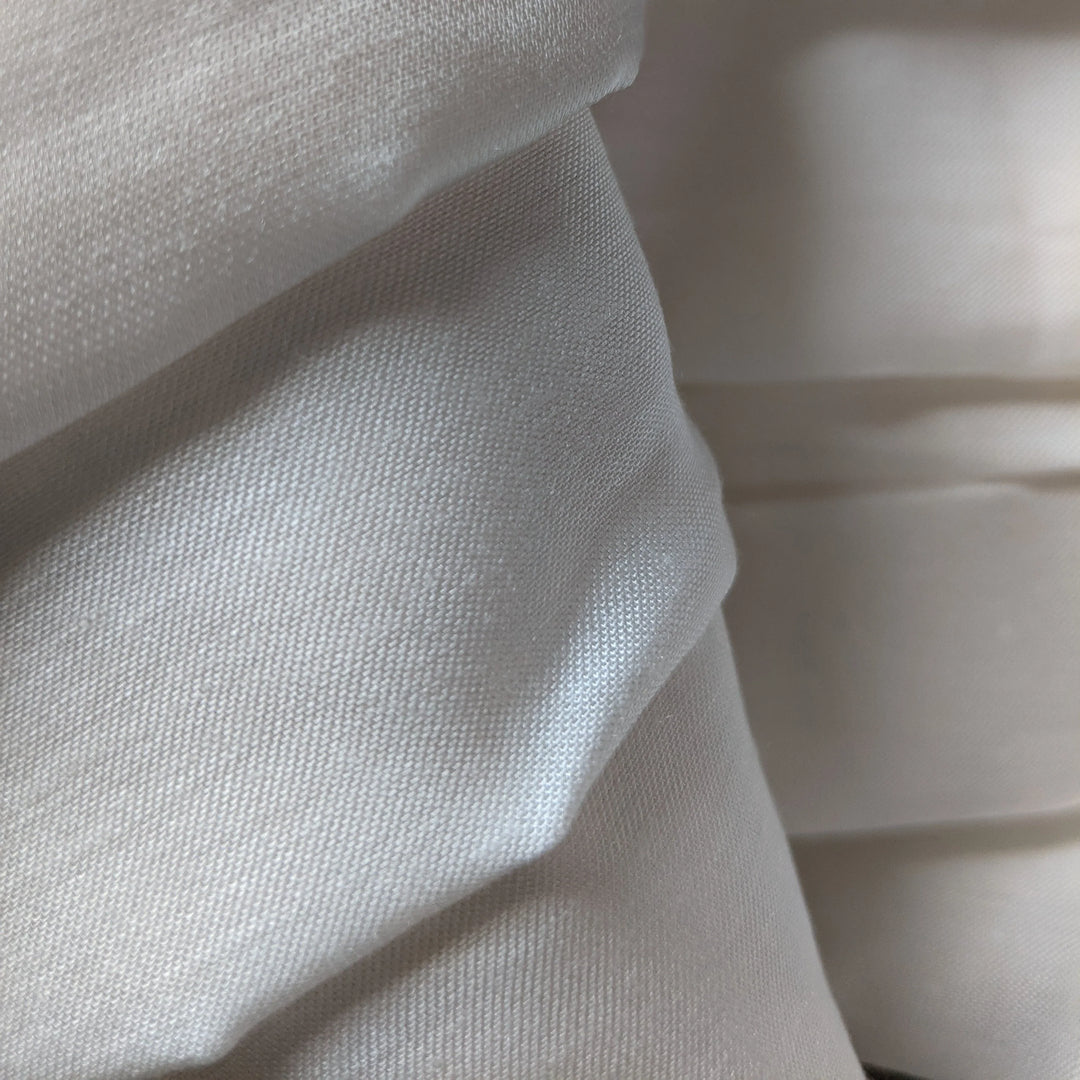 Close-up of sustainable rose petal fabric with smooth finish
