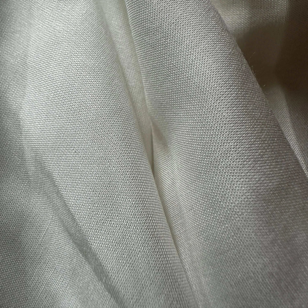 Organic rose petal fiber textile with elegant drape, ideal for minimalist and conscious luxury design