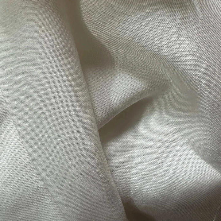 Rose petal fiber vegan silk fabric highlighting fine texture and lightweight construction