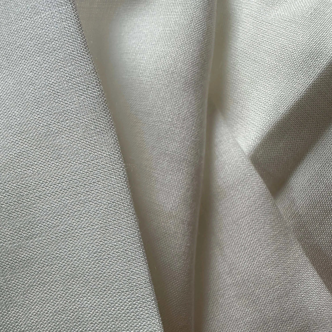 Environmentally responsible rose petal fiber fabric created for modern sustainable fashion labels