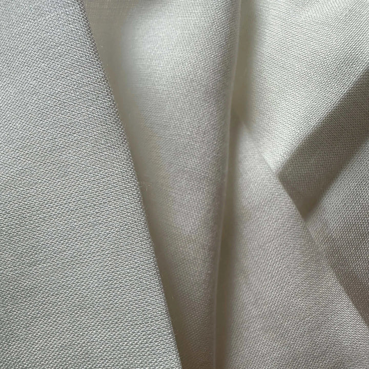 Environmentally responsible rose petal fiber fabric created for modern sustainable fashion labels