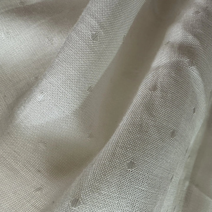 Lightweight rose petal fiber fabric with natural drape, plant-based vegan silk alternative for eco-conscious designers