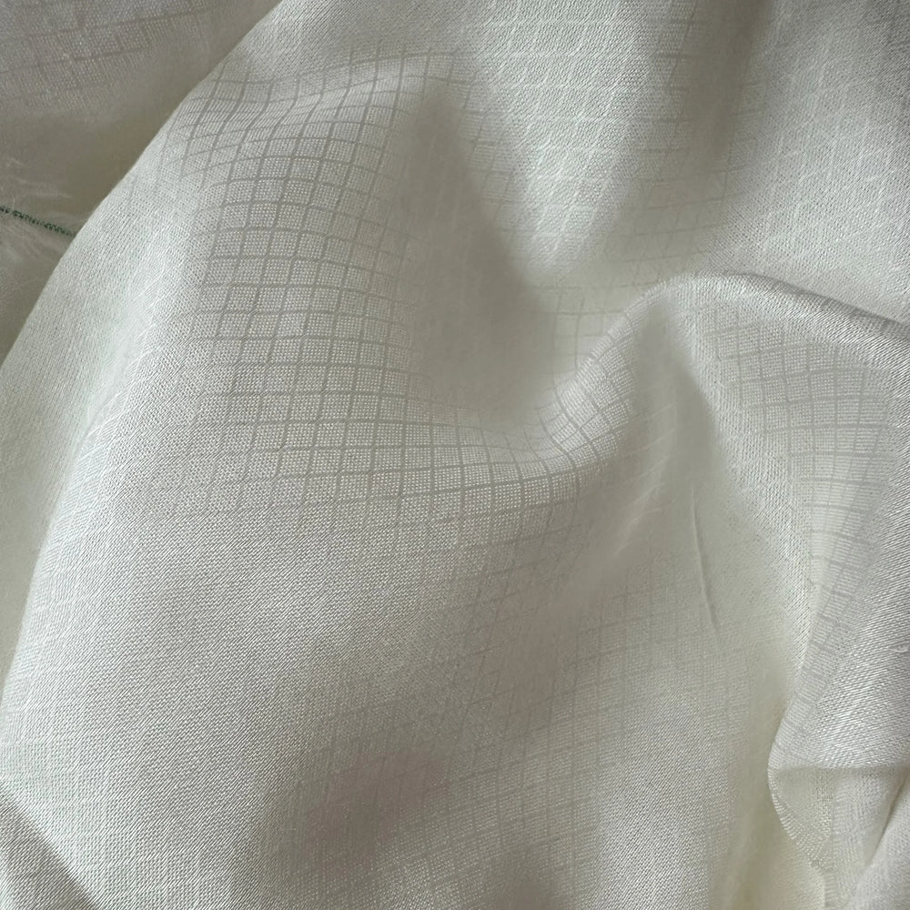Close-up of sustainable rose petal fabric with smooth finish