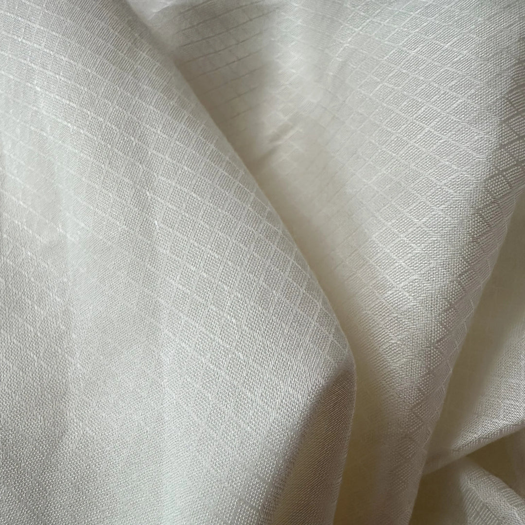 Close-up of sustainable rose petal fabric with smooth finish