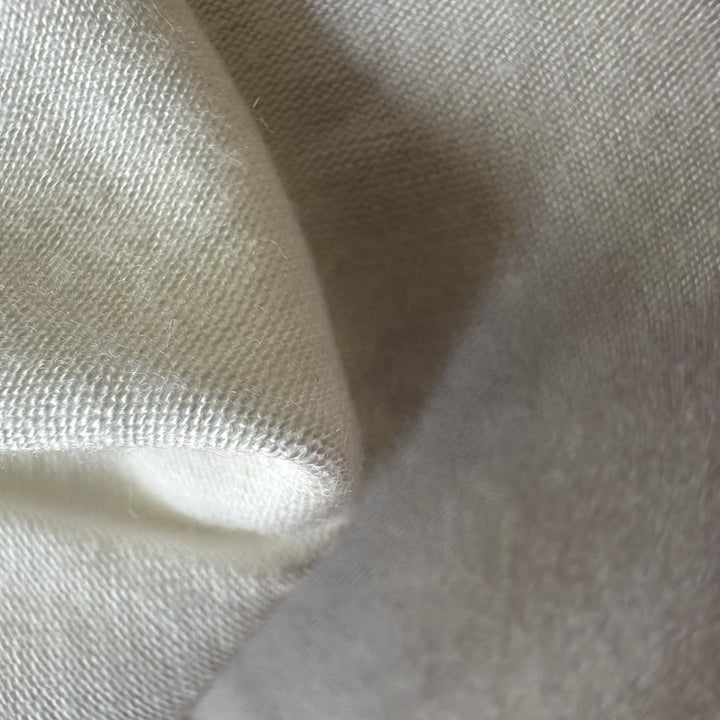Biodegradable rose fiber fabric crafted for sustainable fashion and eco-luxury clothing.