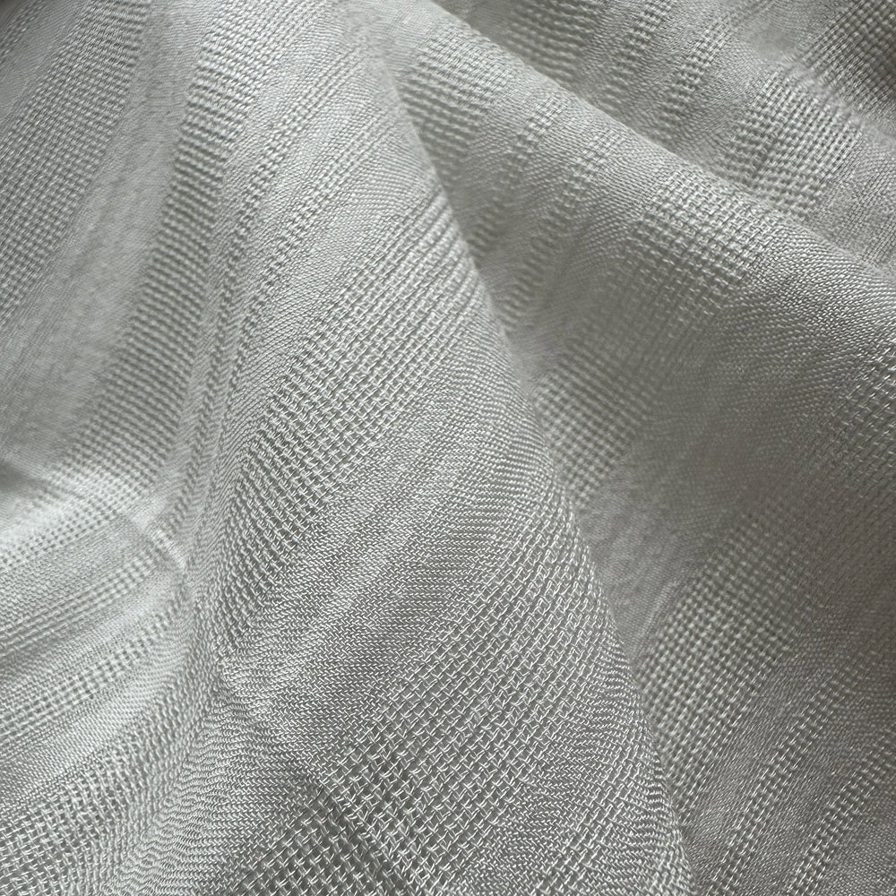 Close up of organic soybean fiber fabric showing lightweight breathable weave