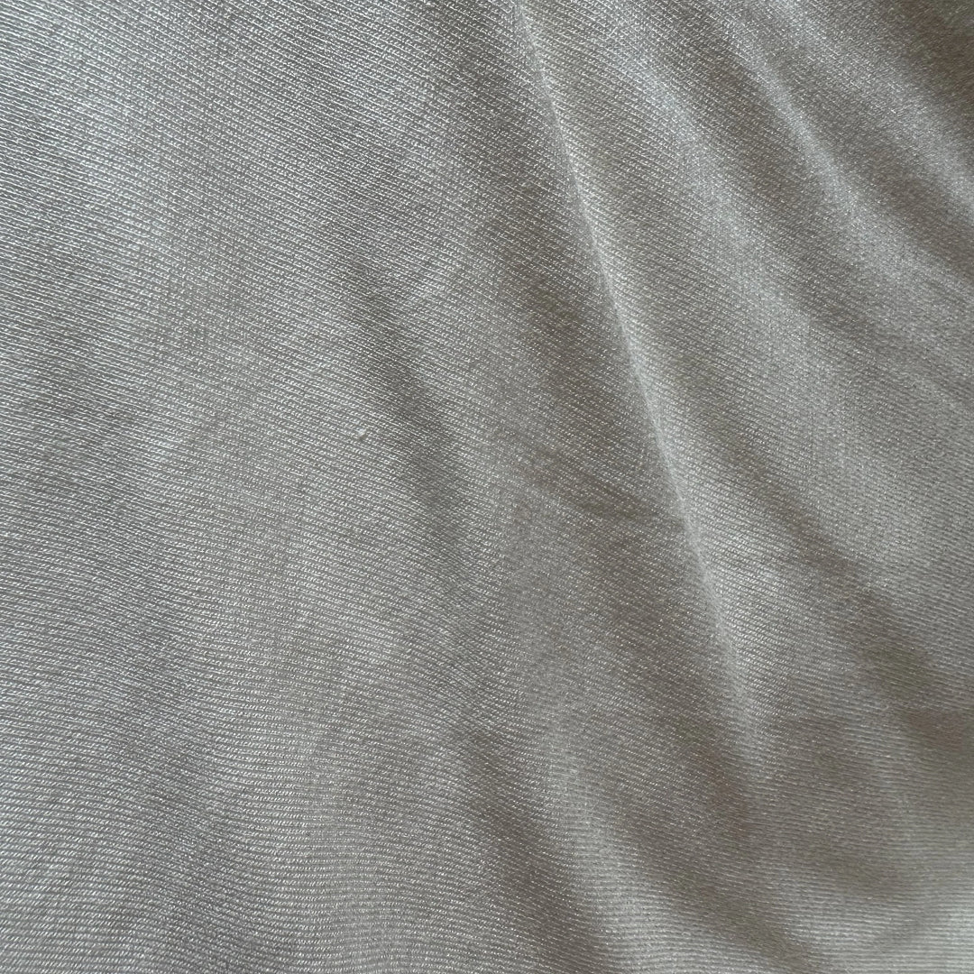 Plant-based soybean spandex knit fabric showing smooth surface and elasticity
