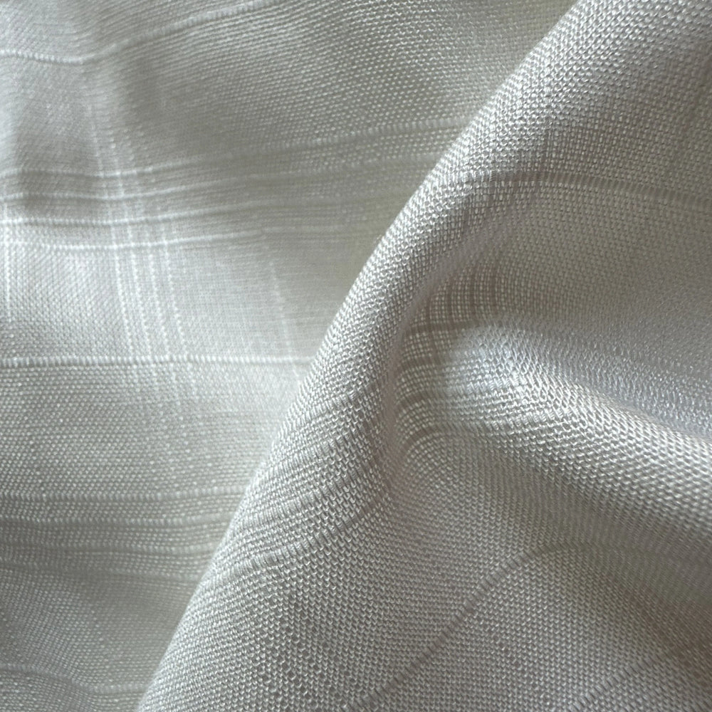 Lightweight sugarcane fiber fabric with smooth feel and breathable structure.