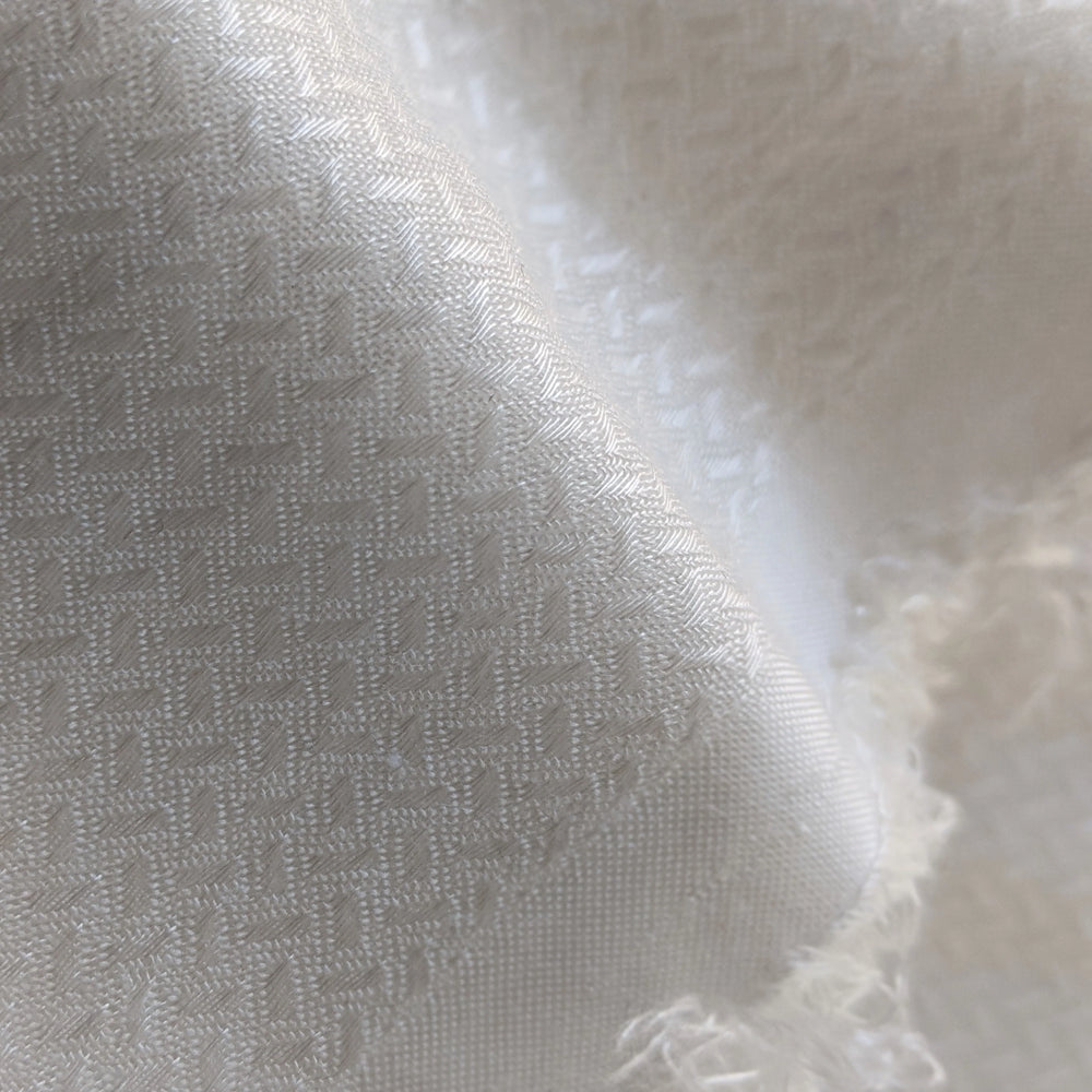 Stacked rolls of 100% sugarcane fiber fabric for sustainable clothing