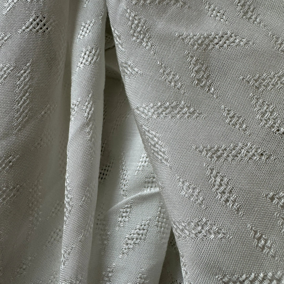 Organic sugarcane fiber fabric showing breathable weave and smooth finish.