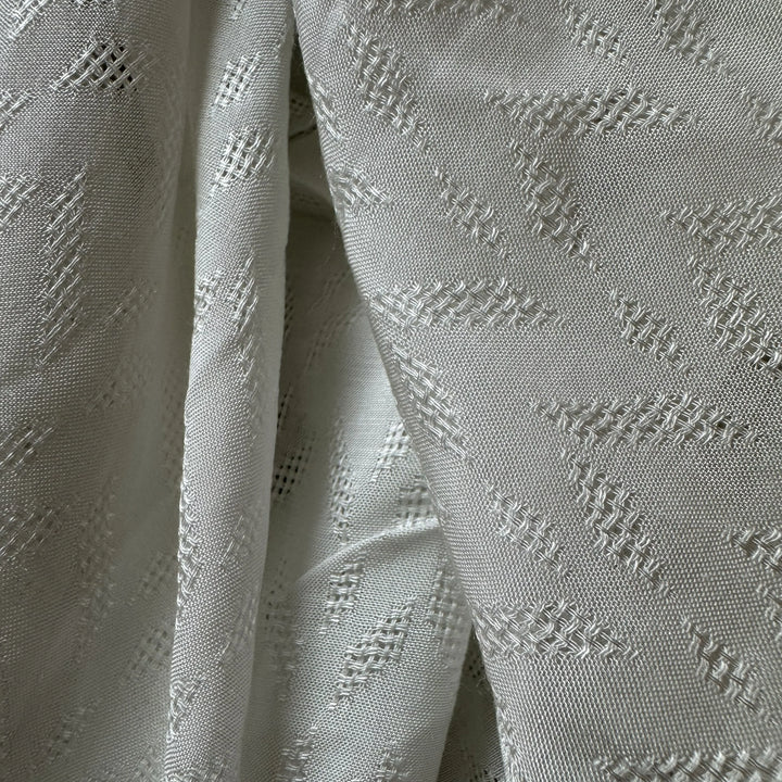 Organic sugarcane fiber fabric showing breathable weave and smooth finish.