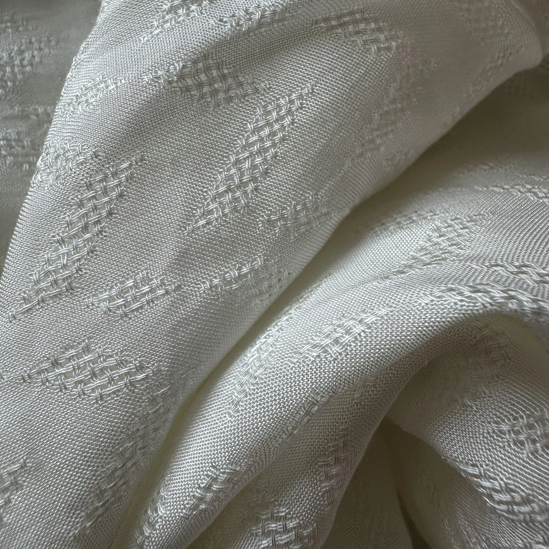Close view of sugarcane fiber fabric highlighting lightweight eco textile quality.