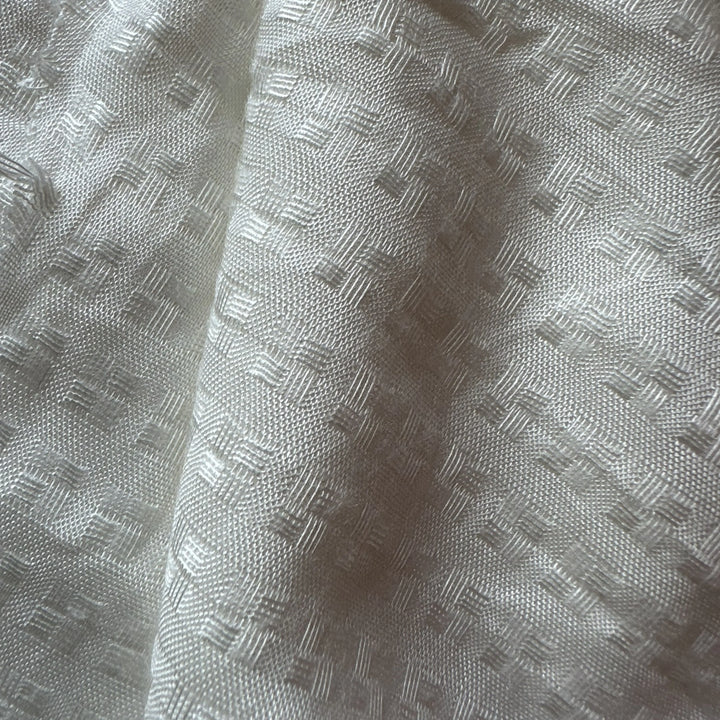 Plant based sugarcane fiber textile for breathable and eco friendly clothing.