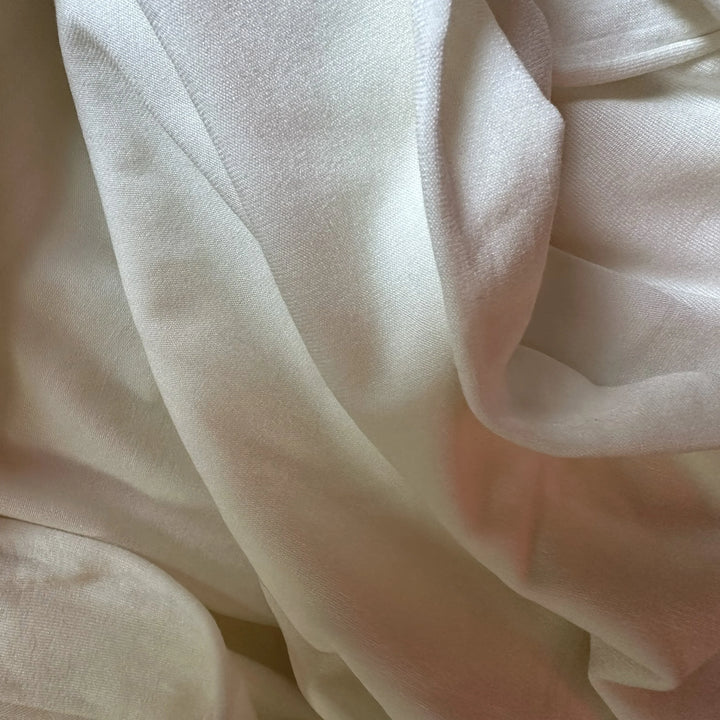 Close-up view of organic sugarcane spandex knitted fabric highlighting clean knit and recovery