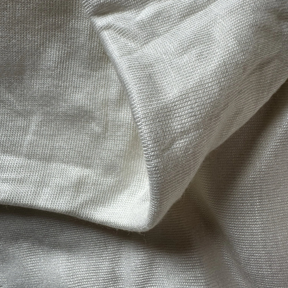 Pure aloe vera knitted single jersey fabric showing lightweight, skin-friendly, and moisture-soothing properties.